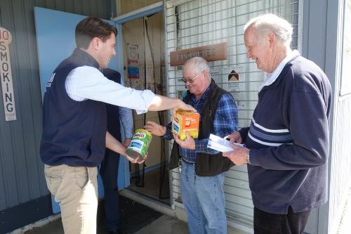 Presenting tea and milo to the Derwent Valley Men's Shed